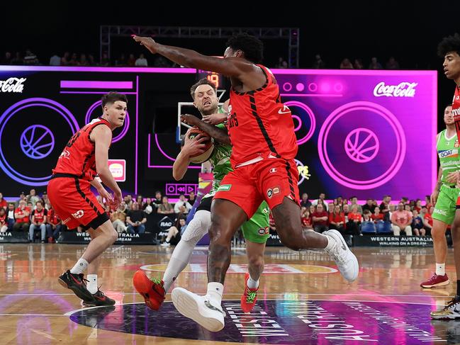 Phoenix recruit Nathan Sobey drives to the key in heavy traffic. Picture: Getty Images