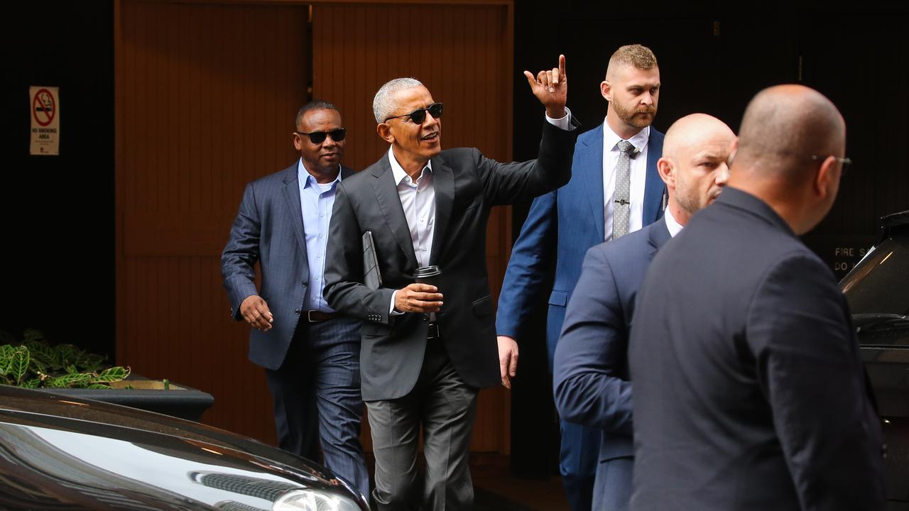 Former US President Barack Obama gave a crowd outside his hotel in Sydney a ‘shakas’ as he visits Australia on a speaking tour. Picture: NCA Newswire / Gaye Gerard