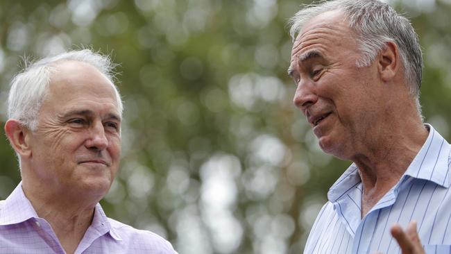 Newly returned Liberal member for Bennelong John Alexander (right) speaks with the PM. Picture: AAP