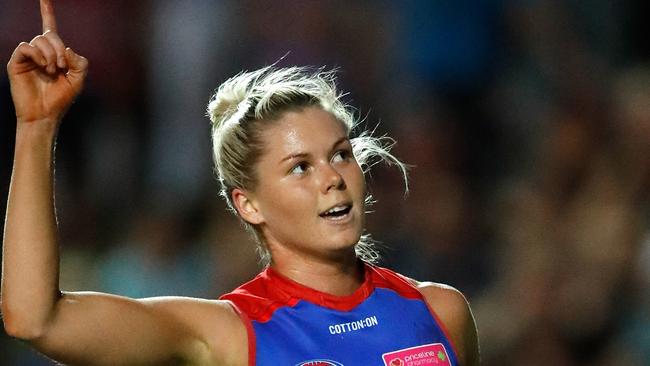 MELBOURNE, AUSTRALIA — MARCH 17: Katie Brennan of the Bulldogs celebrates a goal during the 2018 AFLW Round 07 match between the Western Bulldogs and the Melbourne Demons at VU Whitten Oval on March 17, 2018 in Melbourne, Australia. (Photo by Adam Trafford/AFL Media/Getty Images)