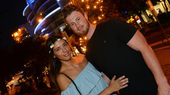 Out and about are Aaron Laskey and Audrey Bru for New Year’s Eve in 2016 at Mooloolaba Beach.