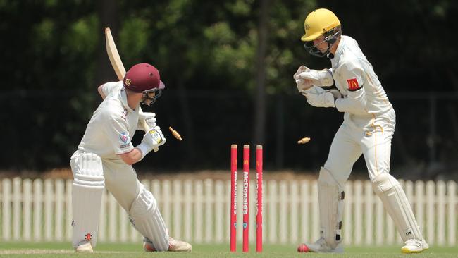 Max Farmer in action behind the stumps for Fairfield-Liverpool. (Photo by Jeremy Ng / Daily Telegraph NewsLocal)