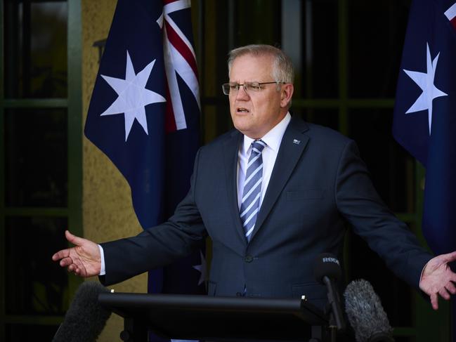 CANBERRA, AUSTRALIA - OCTOBER 07: Australian Prime Minister Scott Morrison speaks at a press conference outside the lodge on October 07, 2021 in Canberra, Australia. Morrison has said that today is a great day for Australia with NSW reaching 70% of people double vaccinated against COVID-19. (Photo by Rohan Thomson/Getty Images)