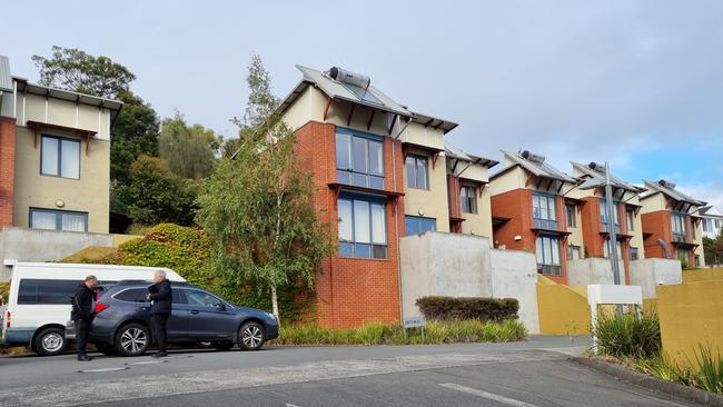 The Harrington St address in Hobart where police found a man deceased in March.