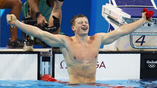 Adam Peaty of Great Britain celebrates winning the Men's 100m Breaststroke.