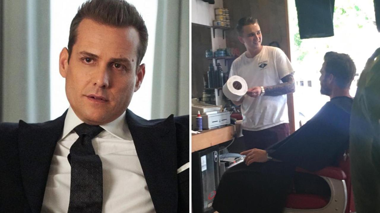 Jimmy Rods Barbershop owner Chris de la Hoyde cutting the hair of Suits star Gabriel Macht.