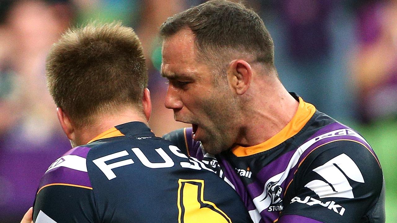 Cameron Munster  celebrates after scoring a try with team mate Cameron Smith 