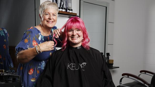 Hairdresser Alison Palmer has dyed her hair bright pink and will have it shaved to raise funds for the national breast cancer foundation by her mother Deena Moroney who is a breast cancer survivor. Picture: Nikki Davis-Jones