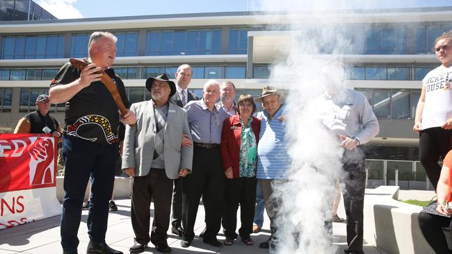 The Darug elders and several Hills Shire councillors hold a smoking ceremony to protest the council shooting down attempts to include an Acknowledgement of country in the council meetings.