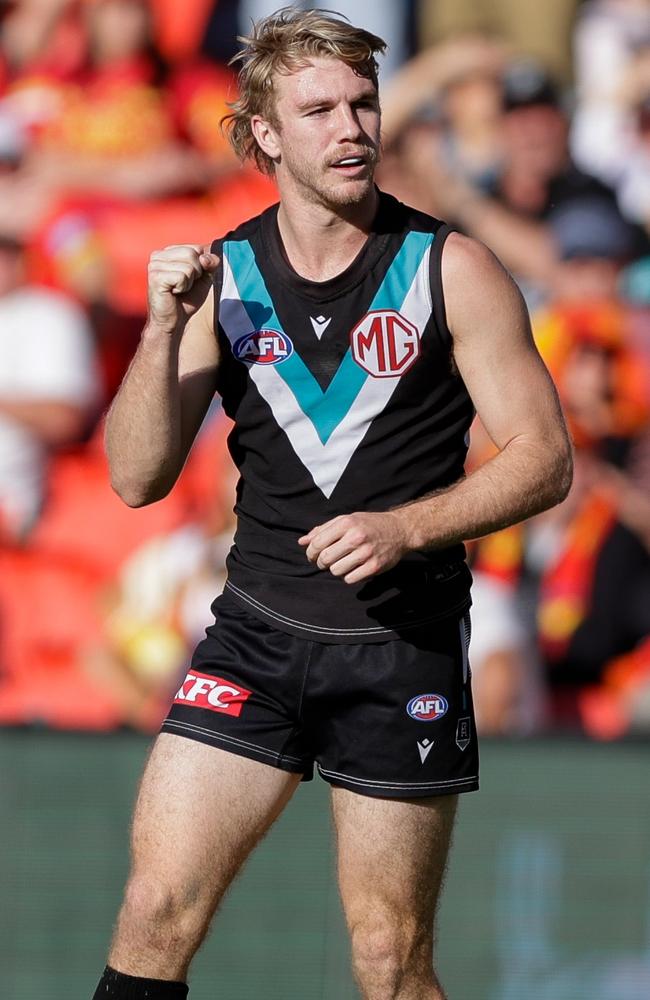 Jason Horne-Francis celebrates a goal against the Suns. Picture: Russell Freeman/AFL Photos via Getty Images.