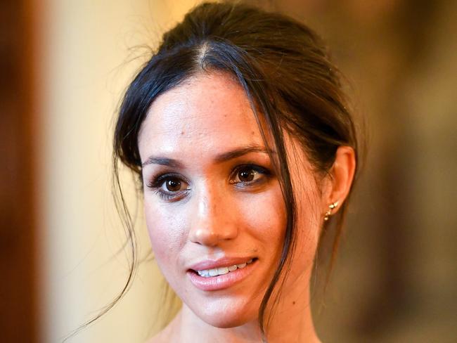 CARDIFF, WALES - JANUARY 18:  Meghan Markle chats with people inside the Drawing Room during a visit to Cardiff Castle on January 18, 2018 in Cardiff, Wales. (Photo by Ben Birchall - WPA Pool / Getty Images)