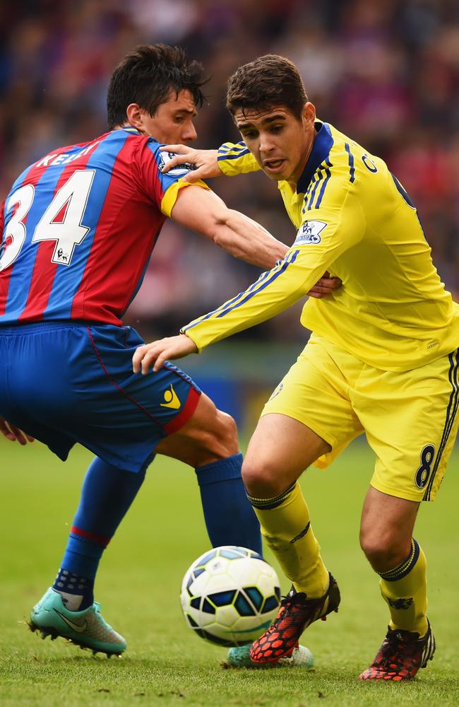 Oscar gets the better of Martin Kelly.