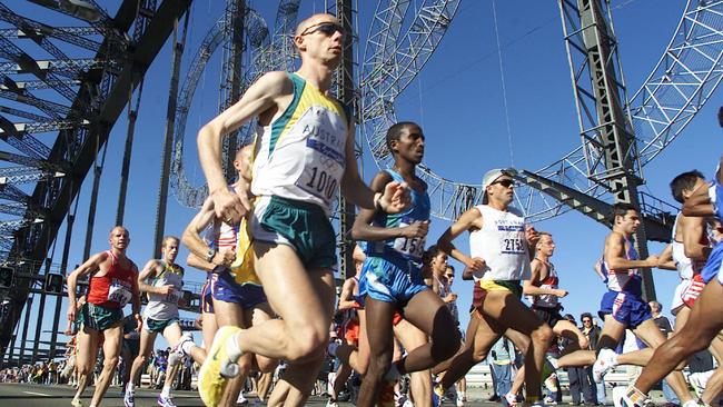 Mr Martin started the Sydney Olympics marathon, pictured, as well as the men’s 100m final.