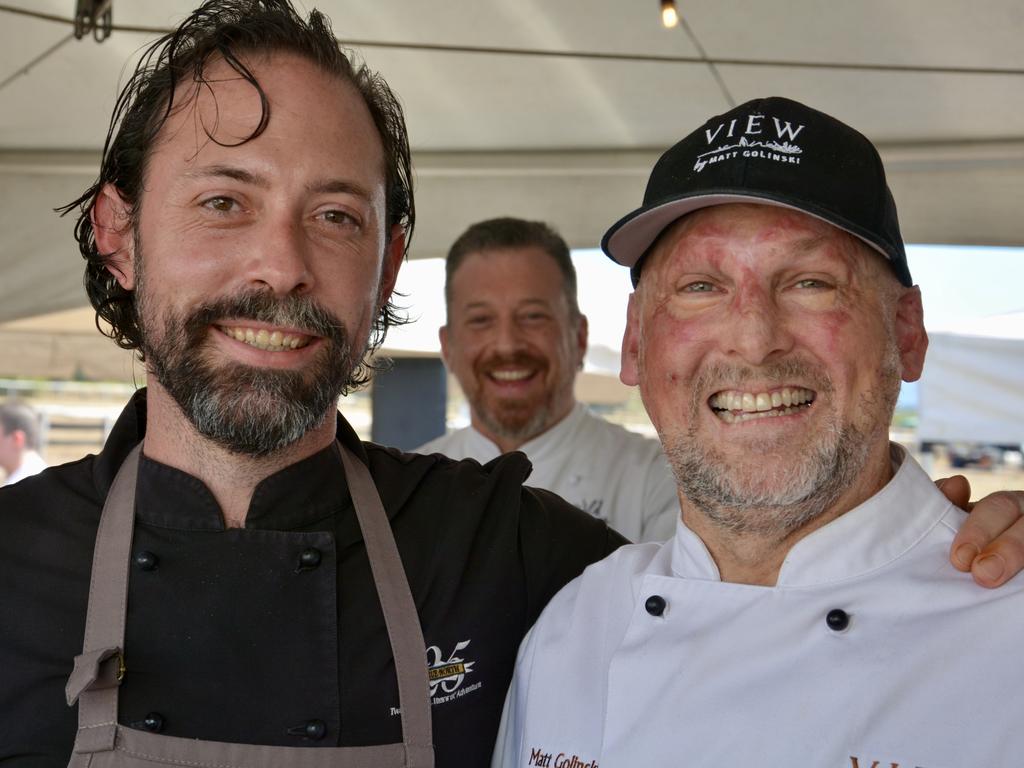 Nik Flack from The Flackyard at Pinnacle and celebrity chef Matt Golinski, with a cameo from the Wild Canary's Glen Barratt (centre), at the Greater Whitsunday Food Network's Lunch at the 2021 St Lawrence Wetlands Weekend. Picture: Rae Wilson