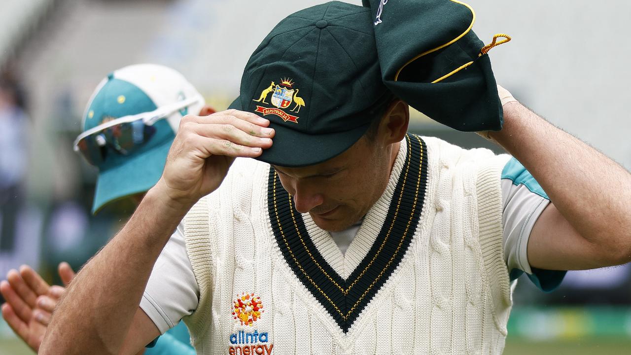 Test debutant Scott Boland receives his baggy green cap before day one of the Boxing Day Test. Picture: Daniel Pockett – CA/Cricket Australia via Getty Images