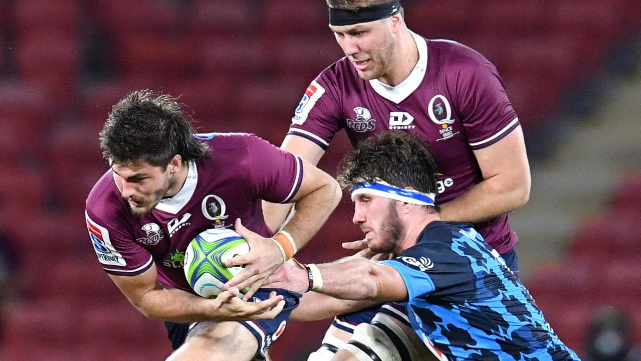 QLD Reds captain Liam Wright (left) has spoken on the departure of three teammates.