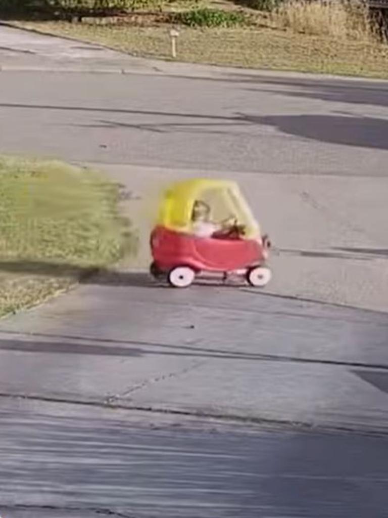 … when his 18-month-old son started to roll down the driveway in his ride-on toy car. Picture: Facebook