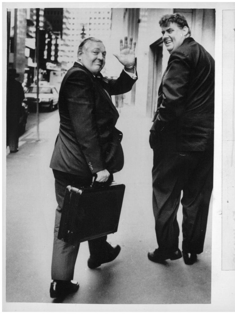 Businessman Alan Bond with his briefcase in hand in the late 1980s. Picture: News Corp