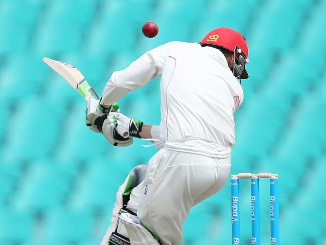 Phillip Hughes is struck on the head by a bouncer.