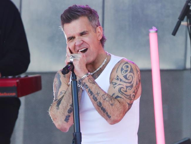 MELBOURNE, AUSTRALIA- NewsWire Photos JANUARY 2, 2025: Entertainer Robbie Williams who is holding a free mini concert at Federation Square Melbourne as part of his publicity tour for the movie Better Man. Picture:  NewsWire/ David Crosling