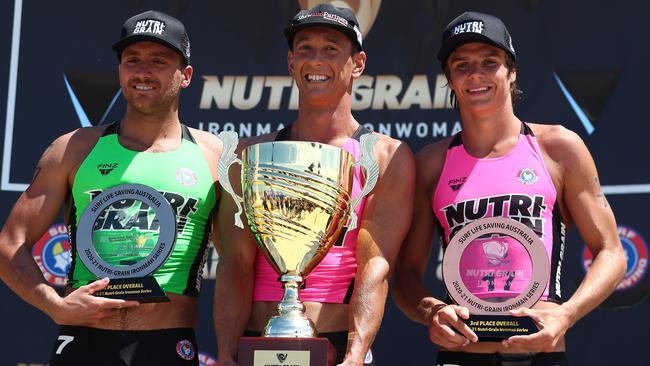 Jy Timperley, Ali Day and Joe Collins on the podium after competing in the Nutri-Grain Ironman series at Kingscliff on February 28, 2021 in Kingscliff, Australia. (Photo by Chris Hyde/Getty Images)