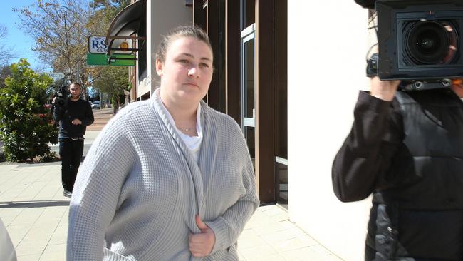 Bianca Sams leaving Wyong Local Court at an earlier appearance last year where she was far less willing to speak to television cameras. (AAP Image/Sue Graham)