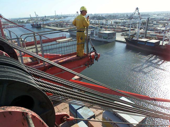 AUST NEWS.4 nov 2000...Story on Australian wharves and how productivity has risen sinse the wharfies dispute.Pic of the Patrick Stevedore wharf in Melbourne.Pic of yard foreman Hassan Bagdadi.Pic by David Crosling