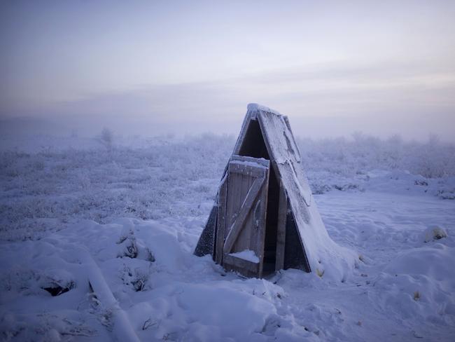 A toilet on the tundra at a petrol stop on the road to Oymyakon Village.