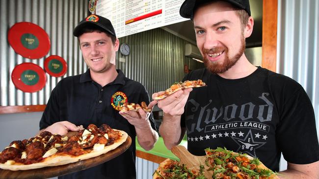 01/05/15 - Godzilla Pizza, South Brighton, is included in the West's top five pizza places. Business owners, Rory McCaffrey,(R) and Tyler Ward with a couple of their popular pizzas. Picture Dean Martin