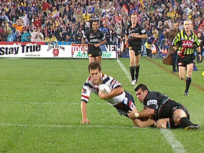 OCTOBER 5, 2003: Video still of match winning tackle by Scott Sattler on Todd Byrne (ball) during Penrith Panthers v Sydney Roosters 2003 NRL Grand Final at Telstra Stadium, Homebush in Sydney, 05/10/03. Pic Channel Nine. Rugby League A/CT