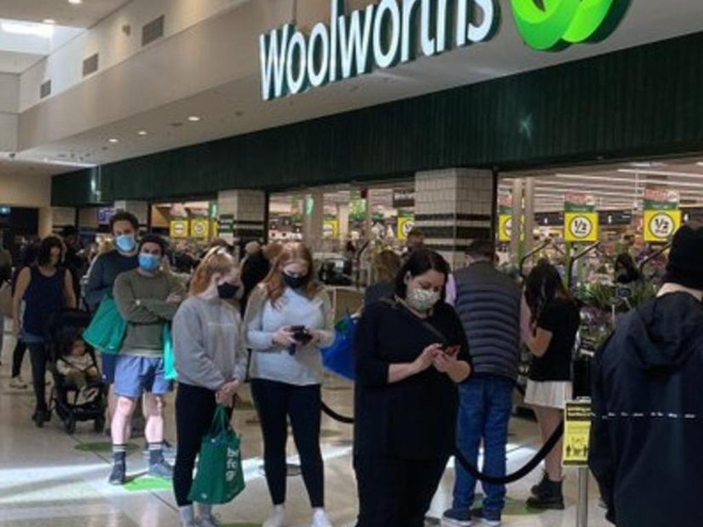 Lines of people outside a Woolworths store after the announcement. Picture: Twitter user @DEBOSS7788