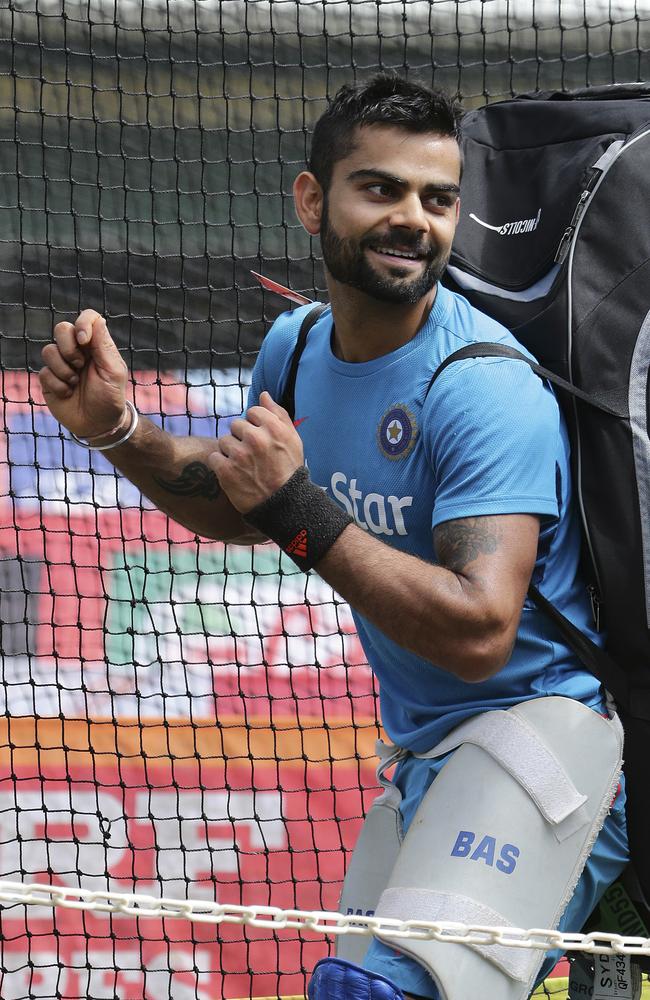 Kohli does a dance after training at the SCG.