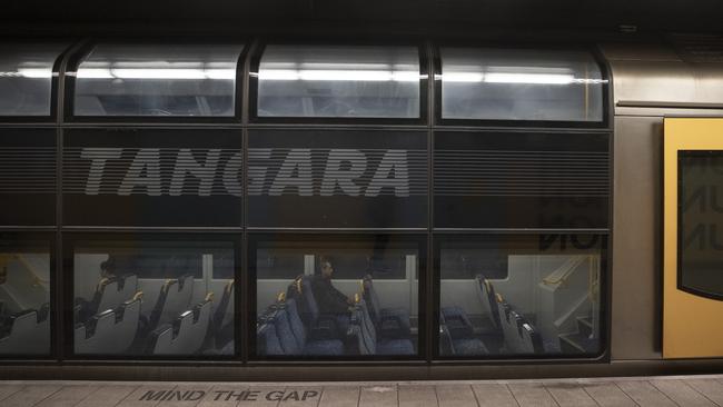 A passenger sits alone in a train carriage at Bondi Junction Station during lockdown. Picture: Getty Images.