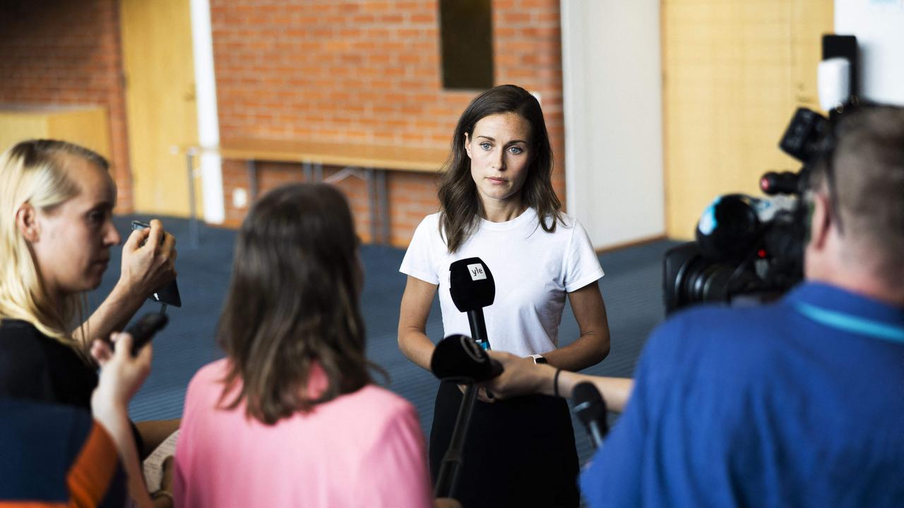 Prime Minister of Finland Sanna Marin answers journalists' questions. (Photo by Matias HONKAMAA / LEHTIKUVA / AFP)