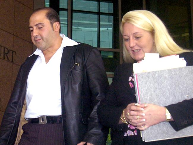 Tony Mokbel  leaves Melbourne Magistrates Court with his lawyer, Nicola Gobbo.