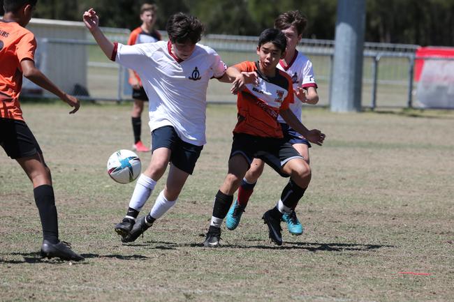 The Premier Invitational football tournament on the Gold Coast. TSS v Logan under-13s in action. Picture: Mike Batterham.
