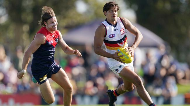 Adelaide’s Shane McAdam dashes away from Melbourne’s Ed Langdon during the Marsh Series game last Saturday. Picture: AAP Image/Michael Dodge