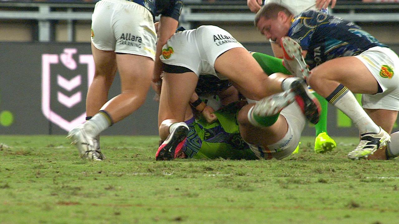 George Williams is tackled on the Queensland Country Bank stadium turf