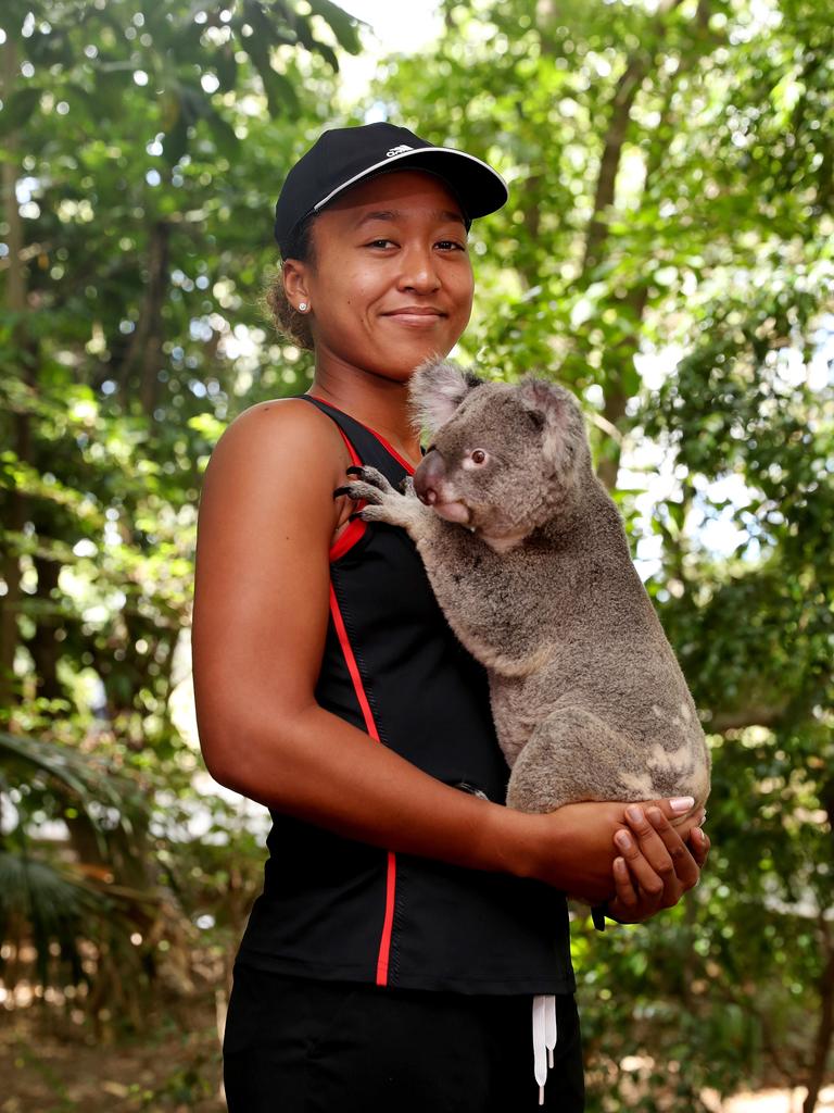 US Open Champion Naomi Osaka of Japan is seen holding Sprocket the koala in 2018. Picture: Tara Croser.