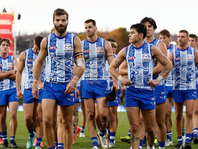 HOBART, AUSTRALIA – MAY 25: The Kangaroos look dejected after a loss during the 2024 AFL Round 11 match between the North Melbourne Kangaroos and Yartapuulti (Port Adelaide) at Blundstone Arena on May 25, 2024 in Hobart, Australia. (Photo by Michael Willson/AFL Photos via Getty Images)