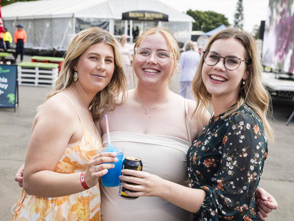 At 2023 Audi Centre Toowoomba Weetwood race day are (from left) Tayla Lord, Montana Wilkins and Gabby Trost. Picture: Kevin Farmer