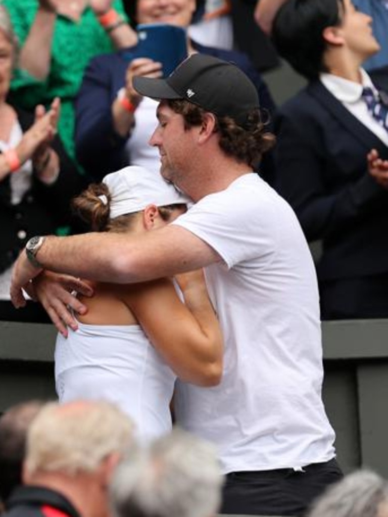 The couple after Ash won Wimbledon. (Photo by Clive Brunskill/Getty Images)