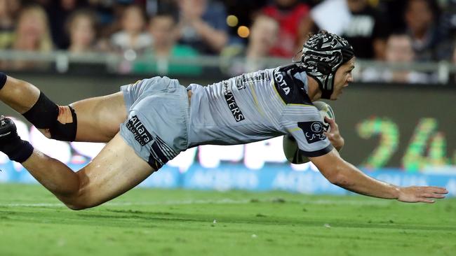 Kalyn Ponga dives over to score a try for the Cowboys. Picture: Richard Gosling