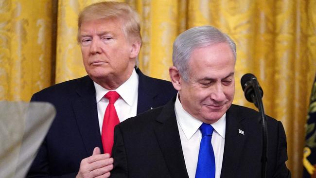 Donald Trump and Benjamin Netanyahu take part in an announcement of Trump's Middle East peace plan in the East Room of the White House in Washington, DC.