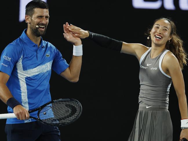 NCA. MELBOURNE, AUSTRALIA. 9th January 2025.   Australian Open Tennis at Melbourne Park. A Night with Novak.  Novak Djokovic high 5s his doubles partner Qinwen Zheng .  Picture: Michael Klein