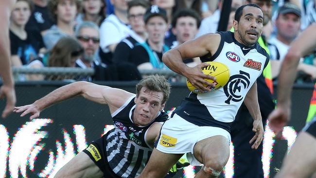 Betts breaks a Jack Hombsch tackle at AAMI Stadium. Picture: SARAH REED.