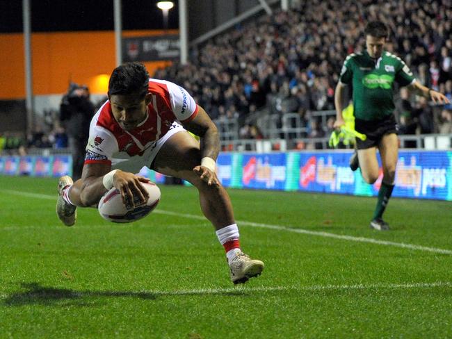 Ben Barba of St Helens scores the opening try.