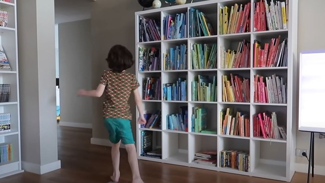 Chloe has collected more than 1000 books over the years. Picture: YouTube