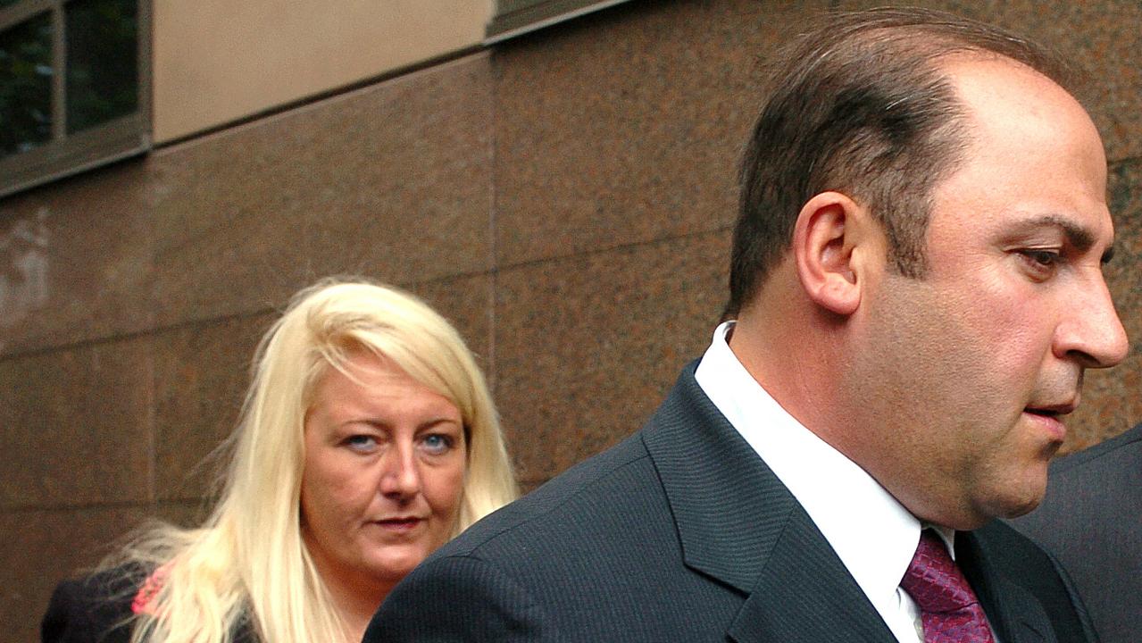 Gangland boss Tony Mokbel with Nicola Gobbo outside court in 2004.