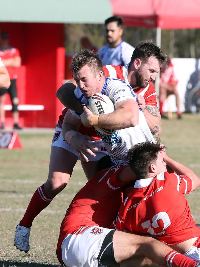 Action pics of Round 16 Rugby League Gold Coast match between Currumbin and Tugun (blue) at Galleon Way (Currumbin Eagles RLFC). Bryce Thomas tackled. Picture: Richard Gosling